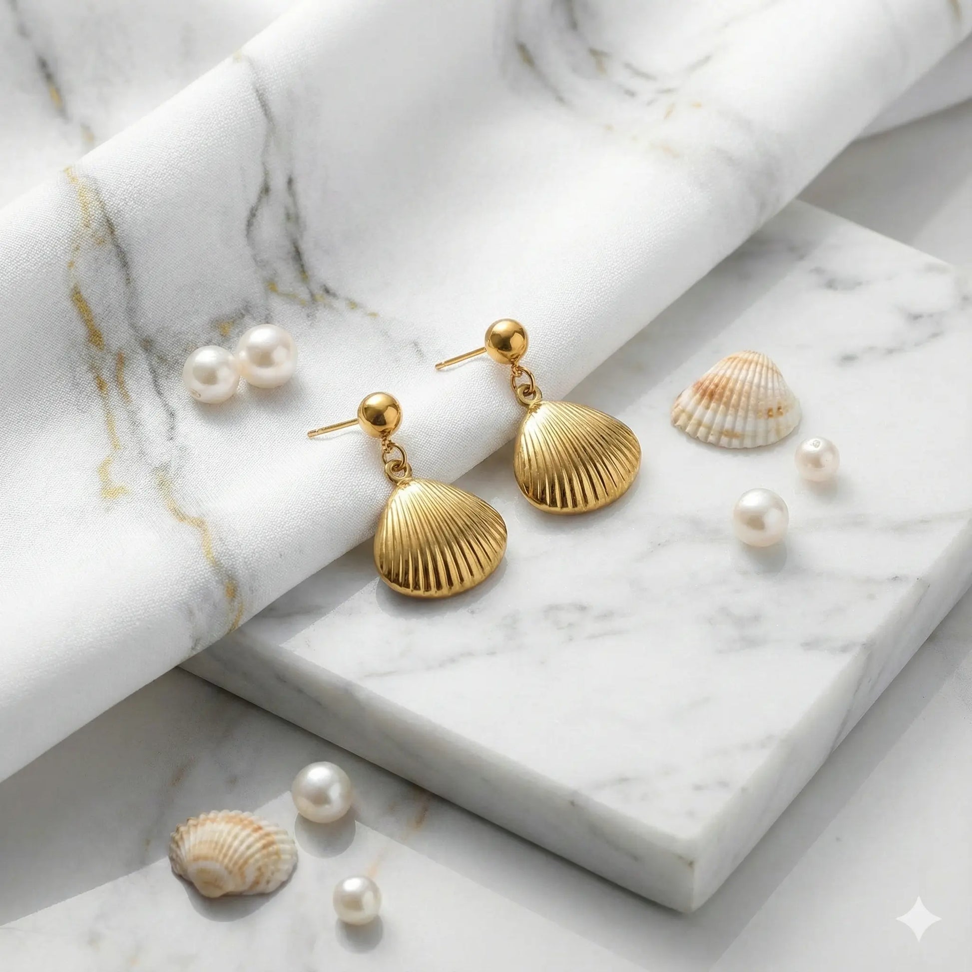 Ocean Treasure Shell Earrings Featuring Glossy Gold Droplets Vavya