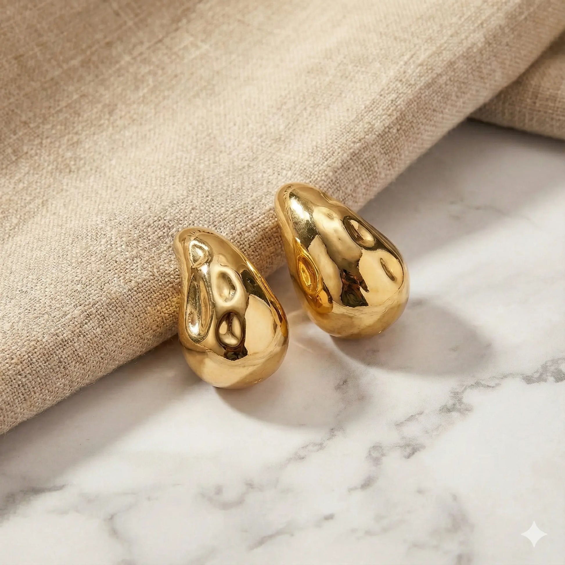 Molten Gold Drop Earrings in High-Gloss Sculpted Finish Vavya