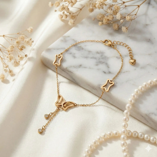 Golden Flutter Anklet with Butterfly Charm & Crystal Droplets Vavya