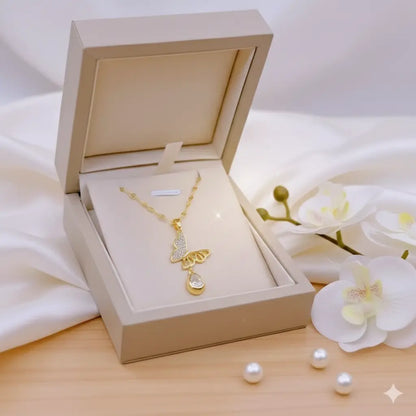 Winged Pearl Drop Necklace in Luxe Gold with Sparkling Crystal Rain Vavya