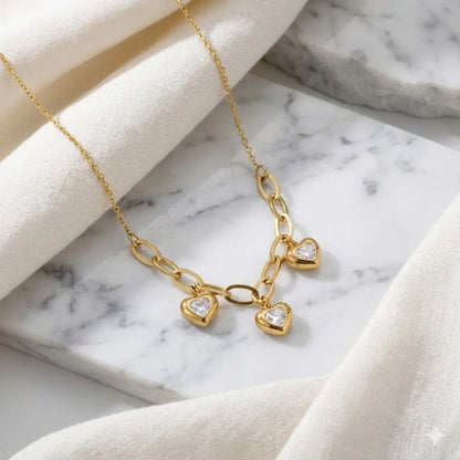 18K Gold-Plated Triple Heart Charm Necklace with Sparkling Crystal Centers Vavya